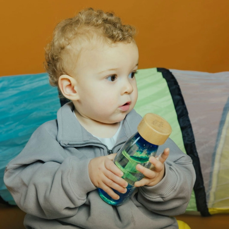 Butelka sensoryczna dwufazowa MOVE SPIRALA niebieska / Petit Boum