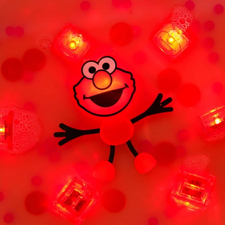 Świecąca postać Elmo w wodzie – zestaw sensoryczny Ulica Sezamkowa