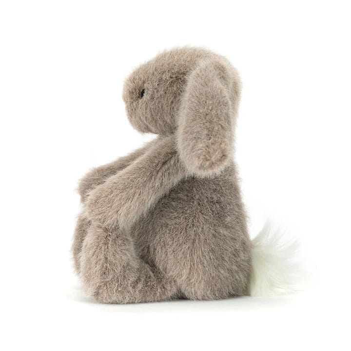 Przytulanka Króliczek Flufflet 18cm fawn Jellycat – widok z boku, beżowy królik z białym ogonkiem, maskotka dla dzieci