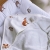 Zbliżenie na chłonną strukturę frotte bambusowej ręcznika Layette Woodland